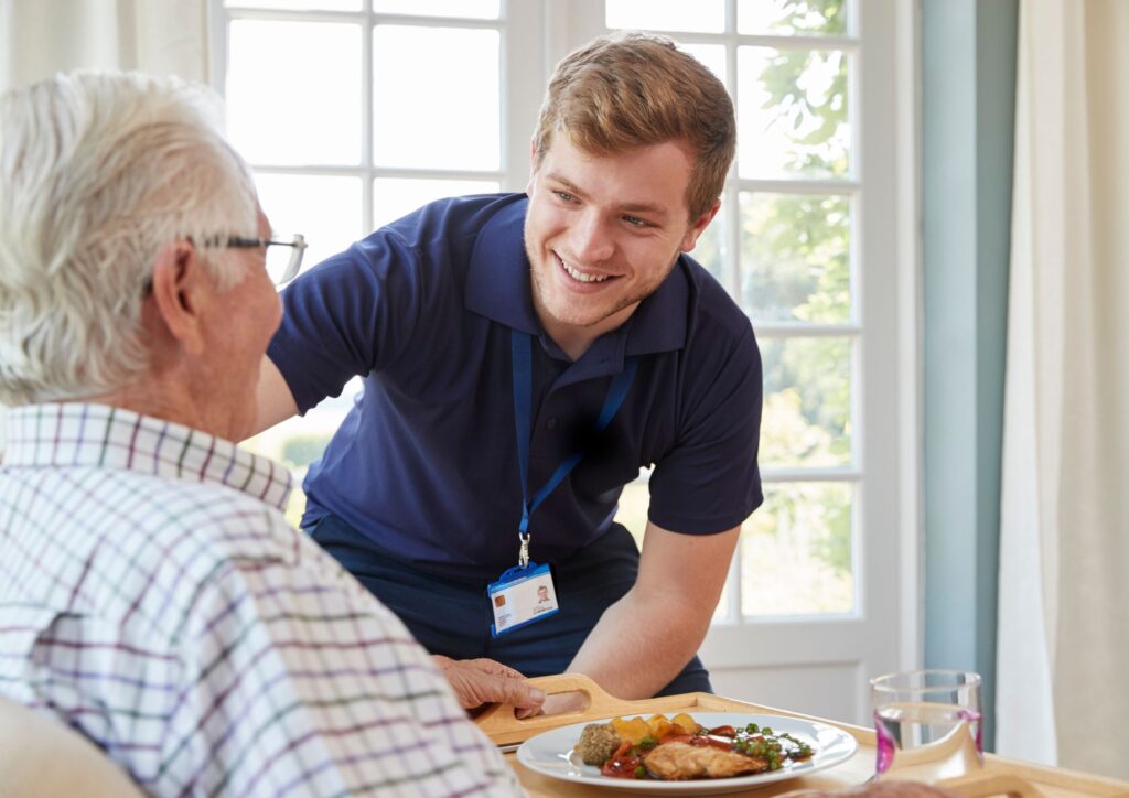 Carer from the healthcare sector with elderly patient